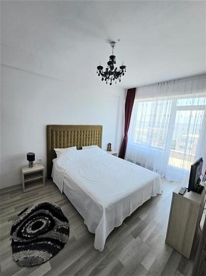 Apartament cu 2 camere semidecomandat, mobilat în Central