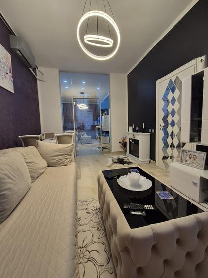 Apartament cu 3 camere decomandat în Roșu
