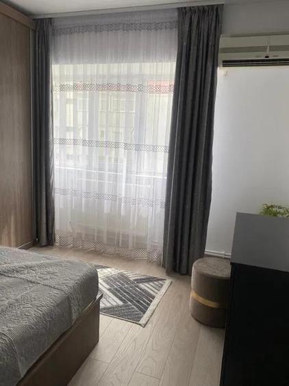 Apartament cu 2 camere decomandat, mobilat în Podul de Fier