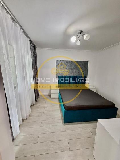 Apartament cu 2 camere semidecomandat, mobilat în Podu Roș