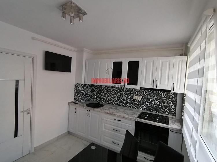 Apartament cu 3 camere semidecomandat, mobilat în Basarabia