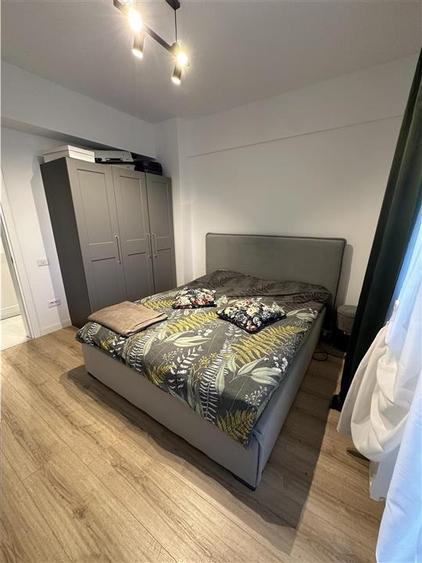 Apartament cu 2 camere semidecomandat, mobilat în Titan