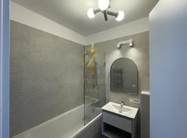 Apartament cu 3 camere semidecomandat, mobilat în Take Ionescu