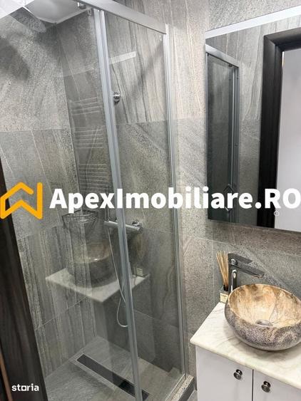 Apartament cu 4 camere decomandat în Titan