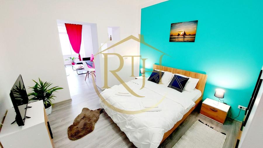 Apartament cu 2 camere semidecomandat, mobilat în Central