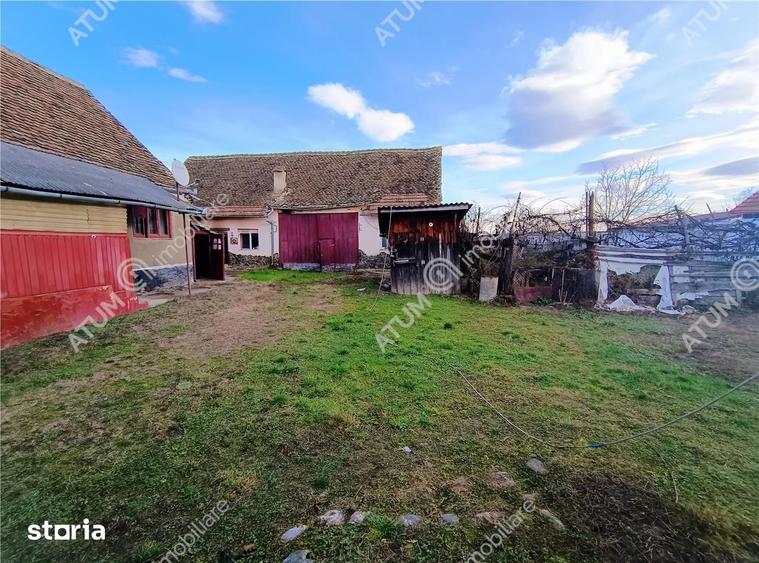 Casă cu 4 camere decomandat cu Teren 1650 Mp în Porumbacu de Jos