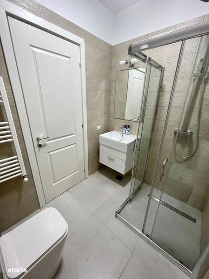 2 camere 54mp - etaj 8/10 - mobilat - loc parcare subteran - INTABULAT - 13