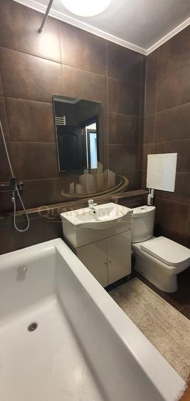 Apartament cu 2 camere semidecomandat, mobilat în Rahova