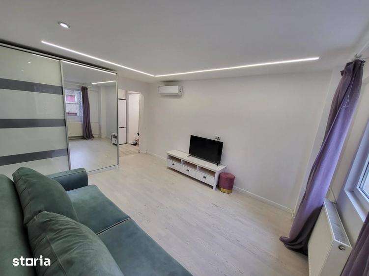 Apartament cu 2 camere semidecomandat, mobilat în P-ța Victoriei