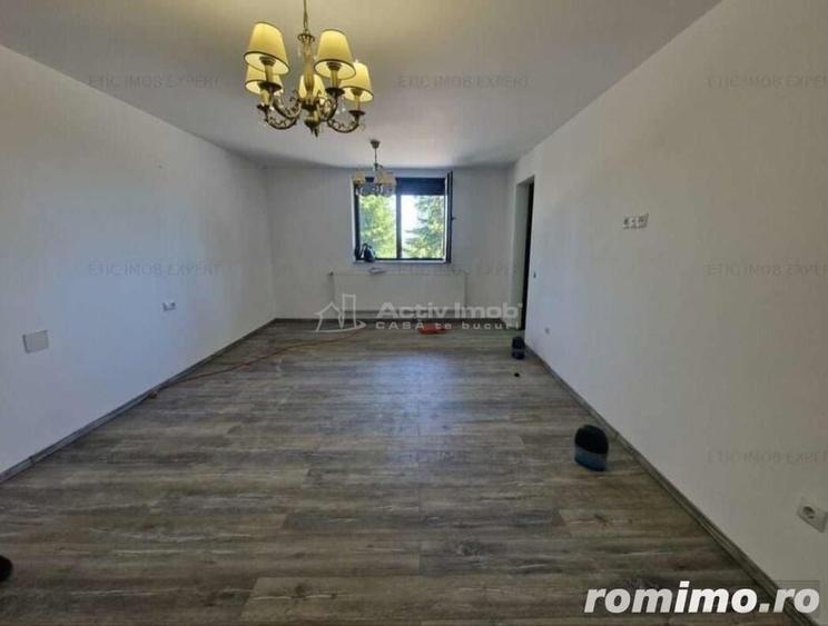 Casă cu 12 camere cu Teren 1000 Mp în Români