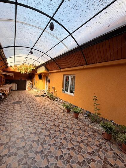 Casă cu Teren 1000 Mp în Central