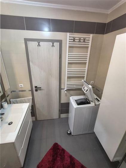 Apartament cu 2 camere decomandate balcon si loc de parcare etajul 1 - 17