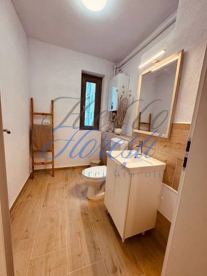 Apartament cu 3 camere semidecomandat, mobilat în Borhanci