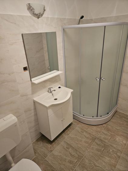 Apartament cu 2 camere semidecomandat în Cățelu