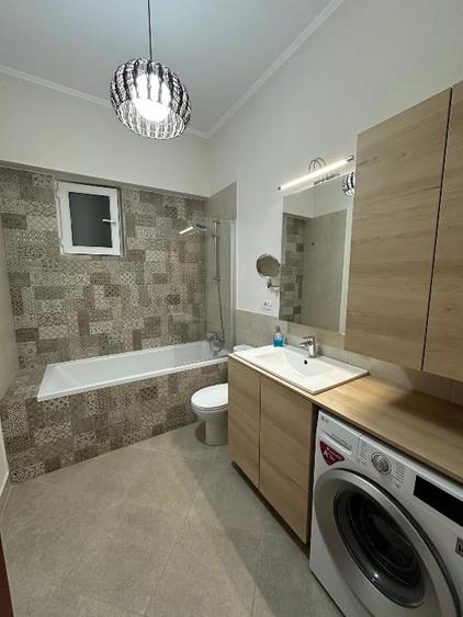 Apartament cu 2 camere semidecomandat, mobilat în UTA