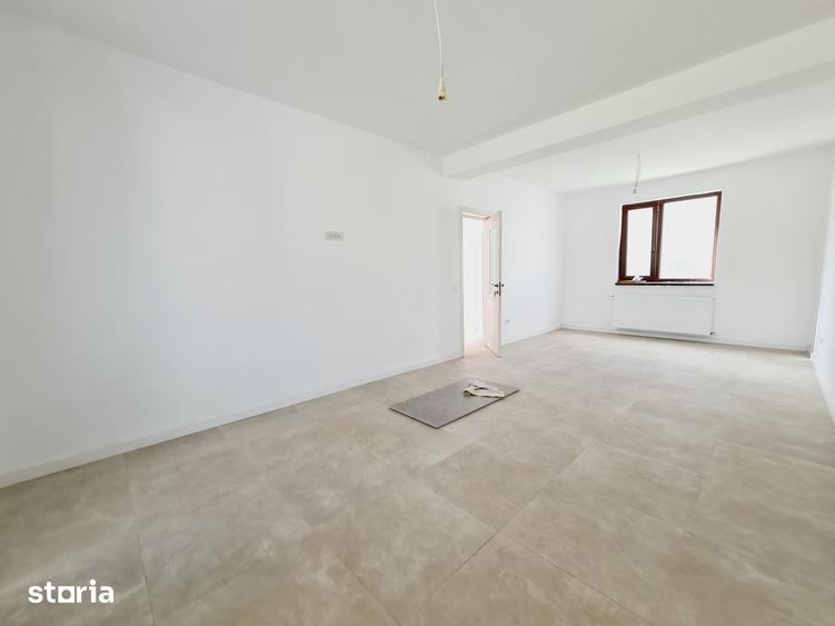 Casă cu 5 camere cu Teren 500 Mp în Bucium