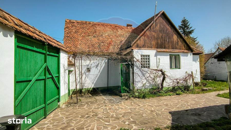 Casă cu 4 camere cu Teren 1631 Mp în Bruiu