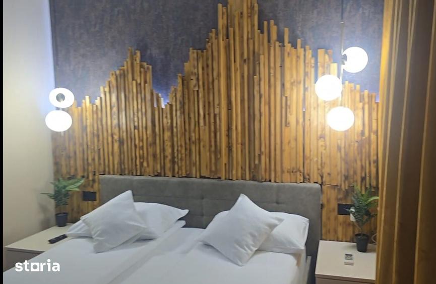 Casă cu 7 camere cu Teren 1500 Mp în Sânmartin