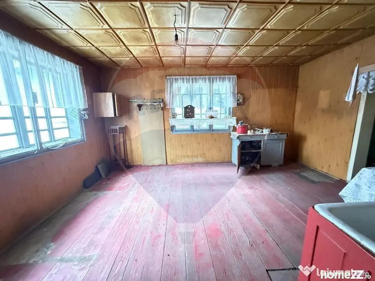 Casă cu 4 camere cu Teren 694 Mp în Central