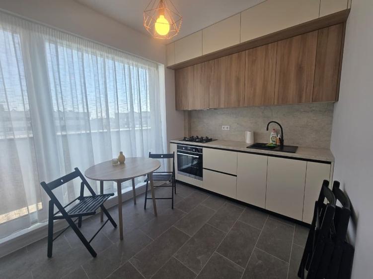Apartament cu 2 camere semidecomandat, mobilat în Chitila