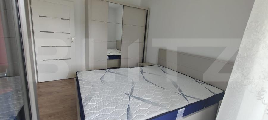 Apartament cu 2 camere semidecomandat, mobilat în Calea Moldovei