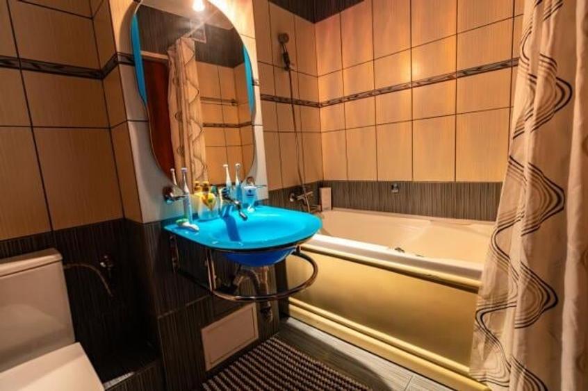 Apartament cu 4 camere decomandat în Central