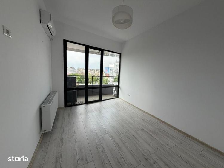 Spatiu de inchiriat cladire moderna, central, etaj 3 cu lift, tera - 1