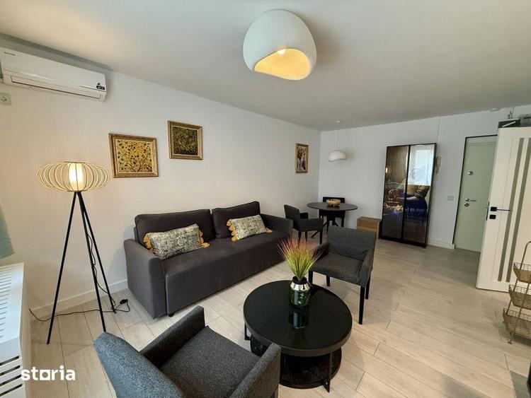 Apartament cu 2 camere semidecomandat, mobilat în Victoriei