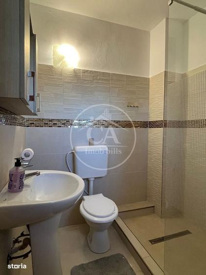 Apartament cu 4 camere decomandat în Rontău