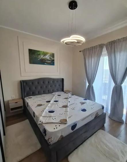 Apartament cu 2 camere semidecomandat, mobilat în Baciu