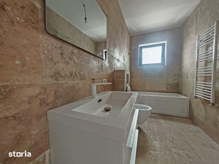 Casă cu 4 camere cu Teren 310 Mp în Tunari