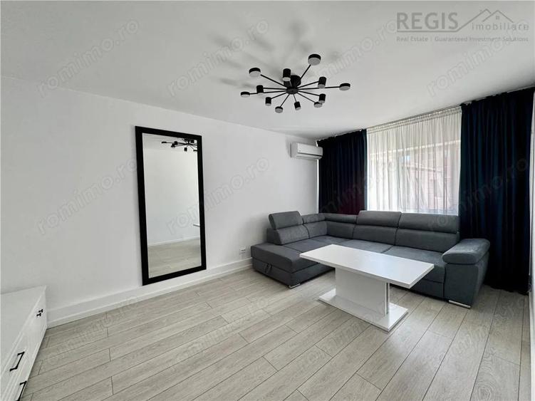 Apartament cu 3 camere decomandat, mobilat în Calea București