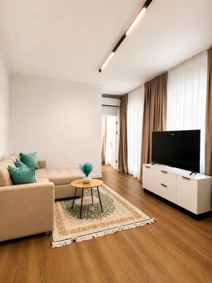 Apartament cu 2 camere semidecomandat, mobilat în 1 Mai