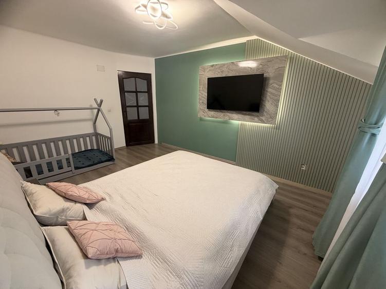 Apartament cu 4 camere semidecomandat, mobilat în Bucium