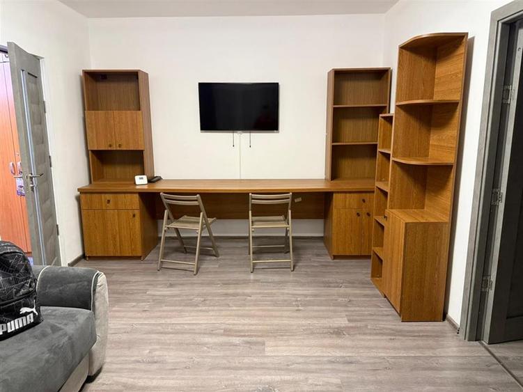 Apartament cu 2 camere semidecomandat, mobilat în Podu Roș