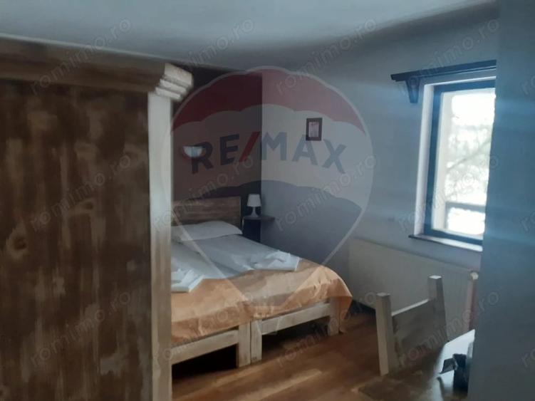 Casă cu 18 camere cu Teren 2880 Mp în Moieciu