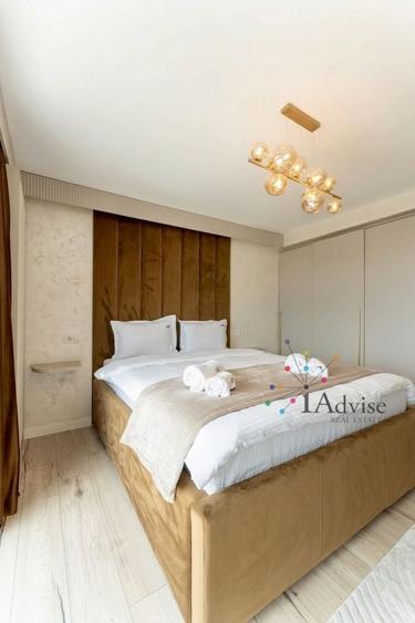 Penthouse cu 3 camere decomandat, mobilat în Tractorul