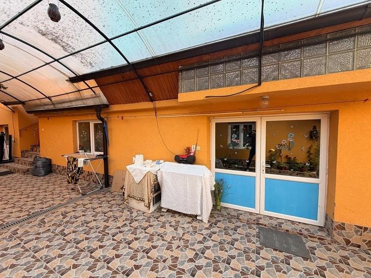 Casă cu Teren 1000 Mp în Central