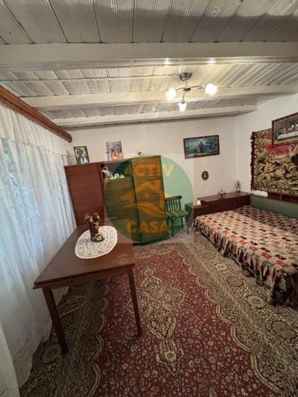 Casă cu 2 camere cu Teren 1000 Mp în Butea