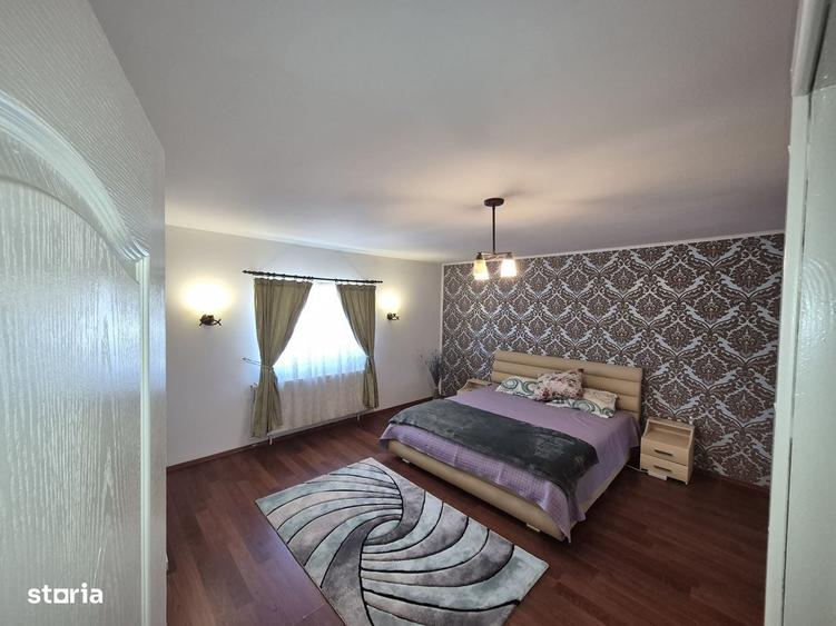 Apartament cu 4 camere decomandat în Bucium