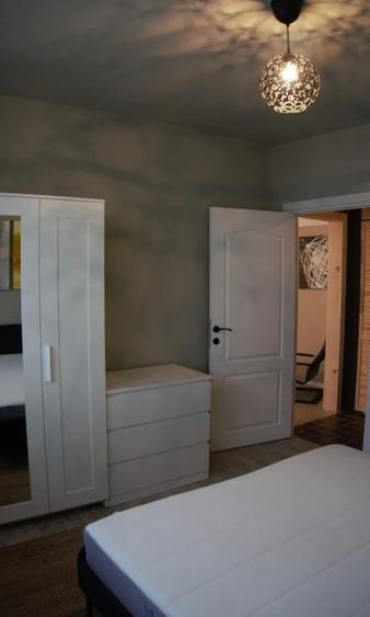 Apartament cu 2 camere semidecomandat, mobilat în 1 Mai