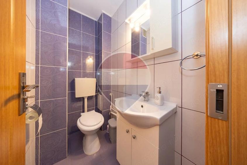 Apartament cu 3 camere decomandat în Tractorul