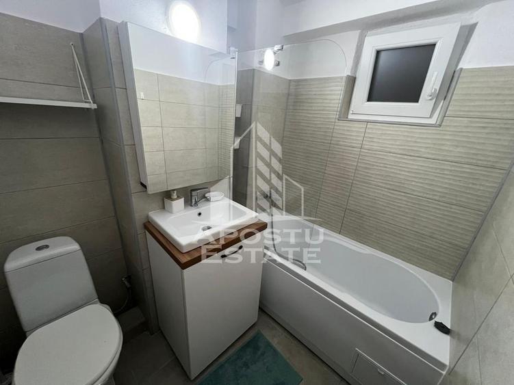 Apartament cu 2 camere semidecomandat, mobilat în Dacia