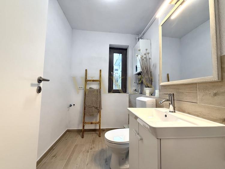 Apartament cu 3 camere semidecomandat, mobilat în Borhanci