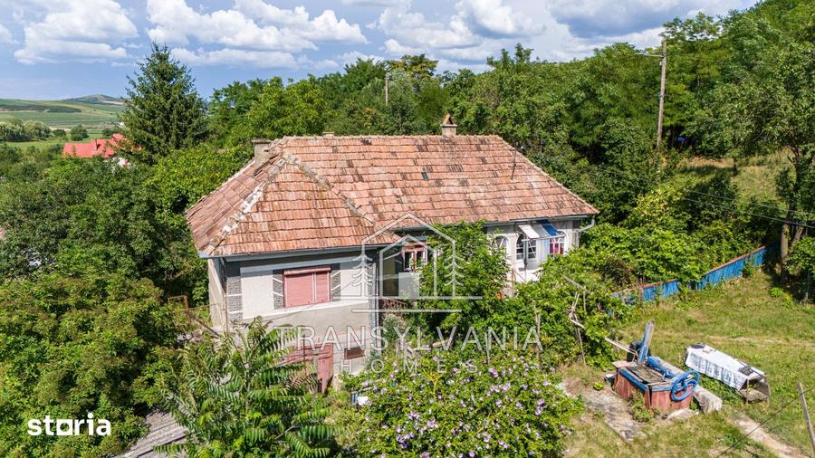 Casă cu 4 camere cu Teren 2560 Mp în Sâmboleni