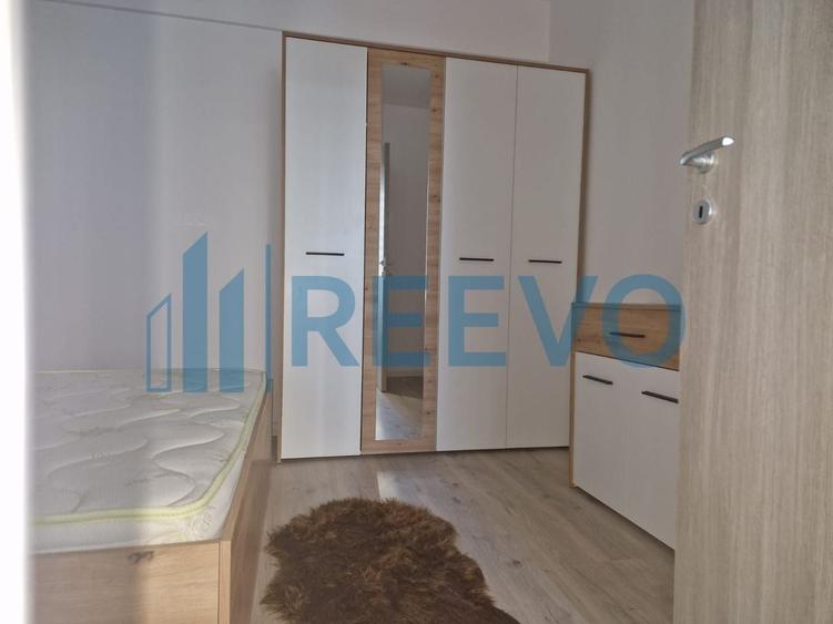 Apartament cu 2 camere semidecomandat, mobilat în Calea Moldovei
