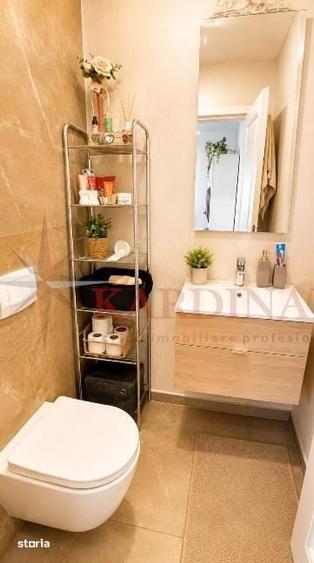 Apartament cu 3 camere decomandat în Tractorul