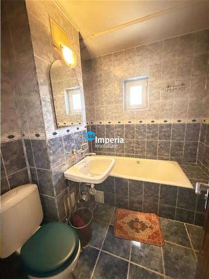 Apartament cu 2 camere decomandat în Podul de Fier