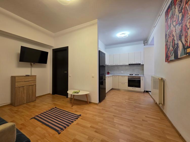 Apartament cu 2 camere semidecomandat în P-ța Universității