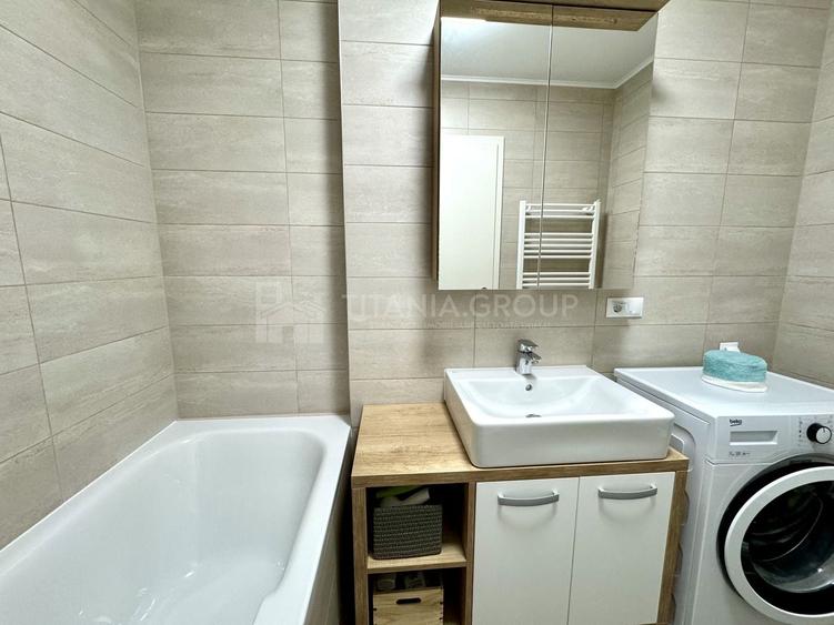 Apartament cu 2 camere semidecomandat, mobilat în Tractorul